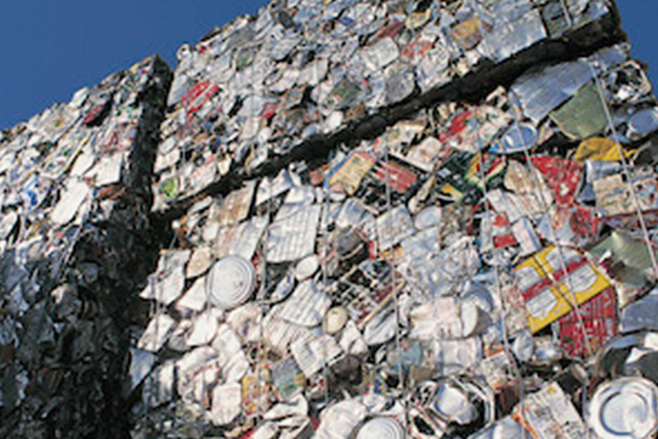 Squashed Cans for Recycling. (Black Press File Photo).