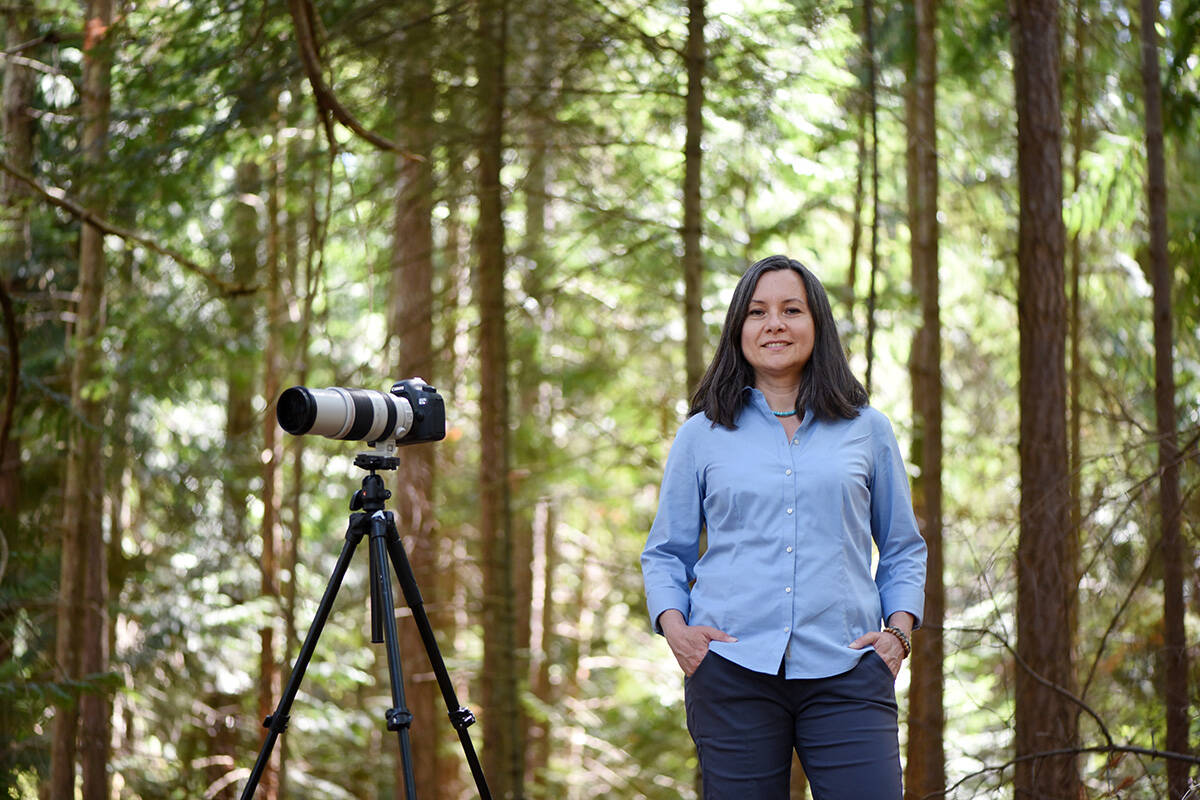 Nature and wildlife photographer Catherine Babault photographed in Moorecroft Regional park in Nanoose Bay. Don Denton photograph