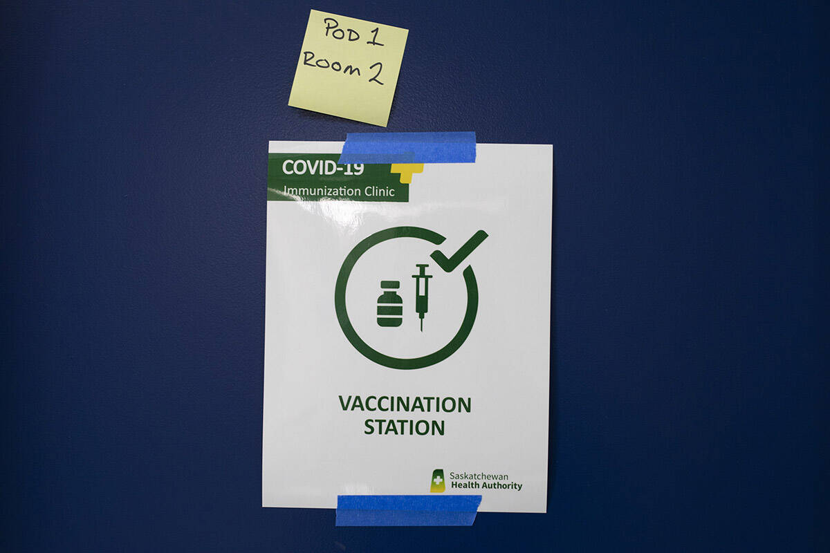 A Saskatchewan Health Authority sign signifying a vaccine station at the Saskatoon Tribal Council run vaccination clinic inside SaskTel centre in Saskatoon, Sask., on Thursday, April 15, 2021. THE CANADIAN PRESS/Kayle Neis