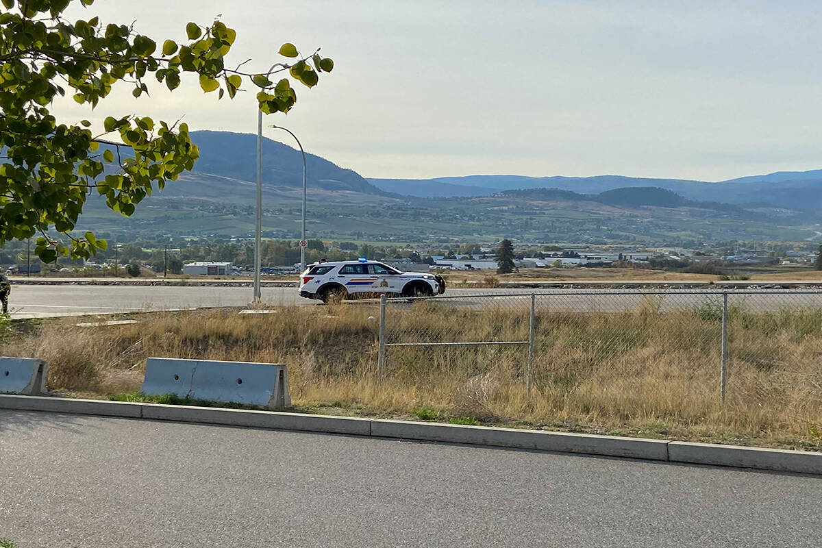 A parked Kelowna RCMP cruiser on Alumni Way on Sept. 23. Mounties have asked the public to avoid the area of Academy Way due to an ongoing police incident. (Twila Amato/Capital News)