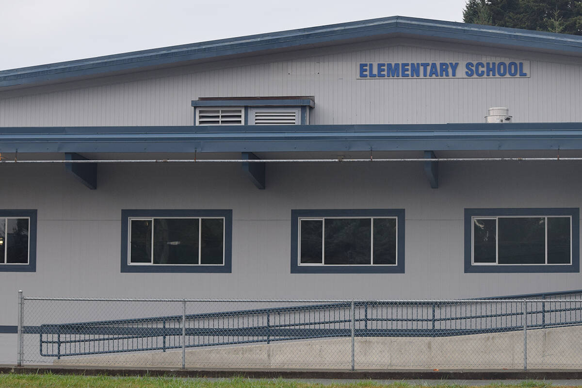 The letters “A.W. Neill” were removed from a Port Alberni elementary school on Sept. 8, 2021. The new name, Tsuma-as, will go up on Sept. 29. (ELENA RARDON / ALBERNI VALLEY NEWS)