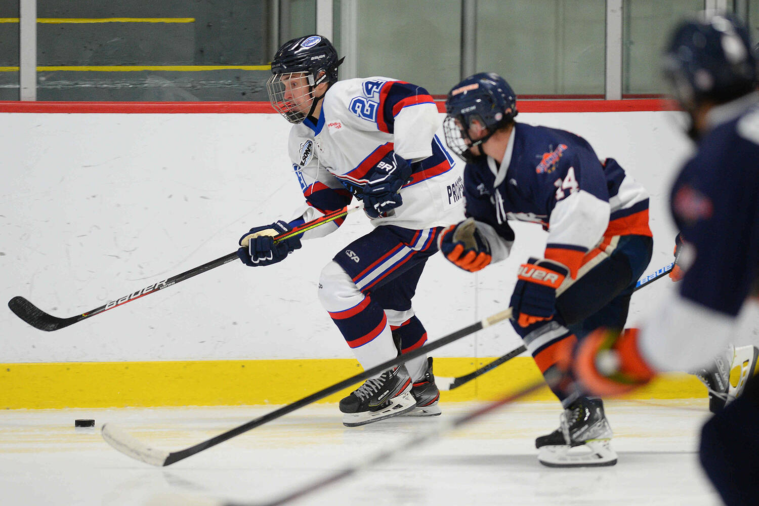 Ryan Grambart (24) carries the puck Friday night at Panorama Recreation Centre, where the Peninsula Panthers dropped a 6-4 game against the Kerry Park Islanders after having led 4-1. (Gordon Lee/Submitted)
