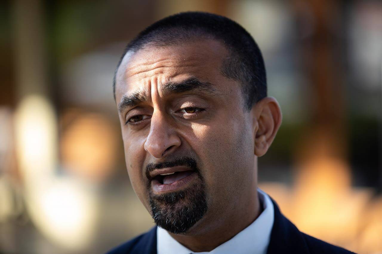 Ravi Kahlon, B.C.’s minister of jobs, economic recovery and innovation, speaks at a restaurant in Delta, B.C., on Wednesday, September 15, 2021. THE CANADIAN PRESS/Darryl Dyck