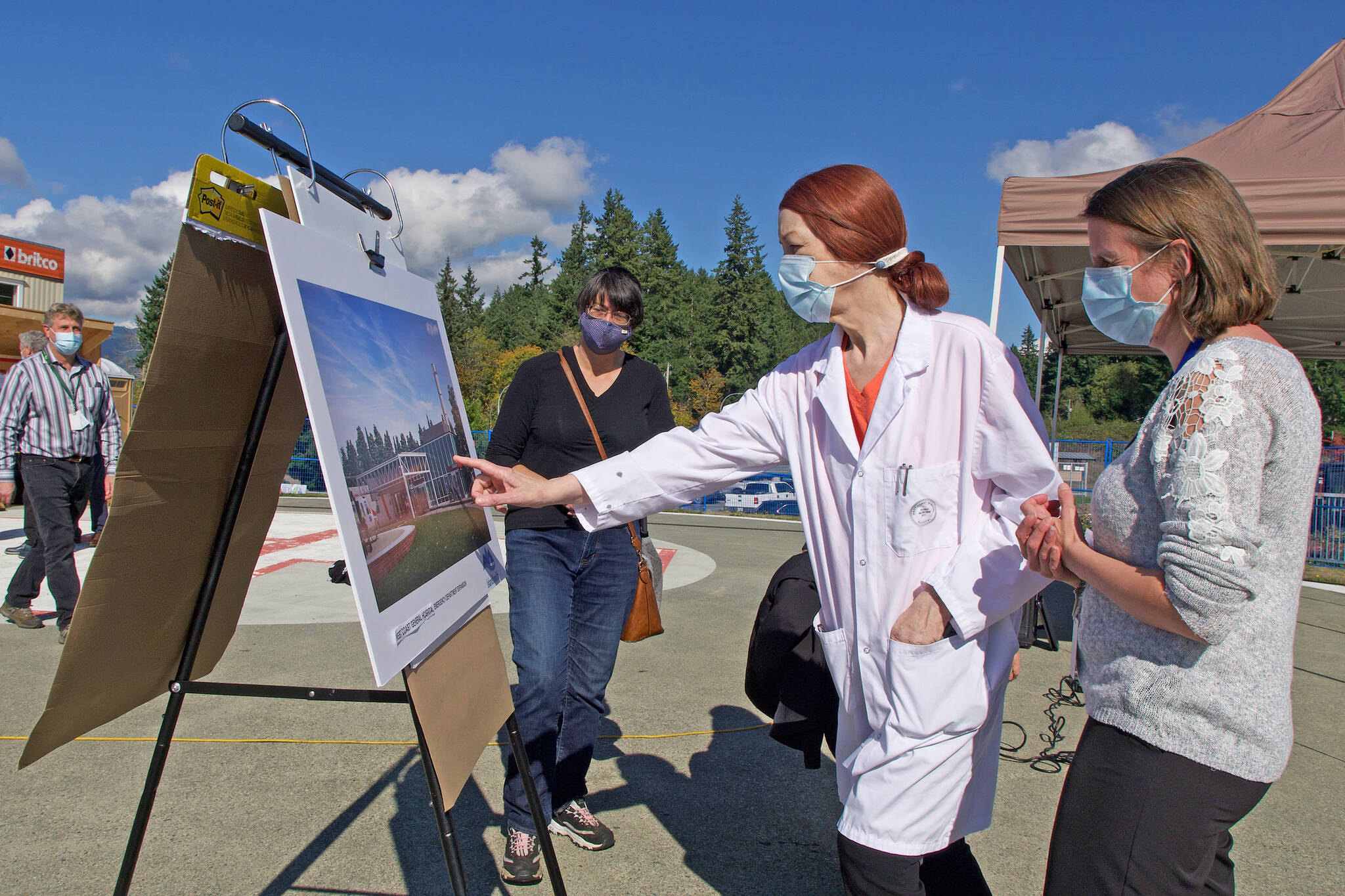 Dr. Dorothy (Sam) Williams, chief of staff and medical director for West Coast General Hospital, checks out an artist’s rendering of the remodeled emergency department. An official groundbreaking for the $6.2-million expansion took place Oct. 8, 2021, although construction began in September. (PHOTO COURTESY ISLAND HEALTH)