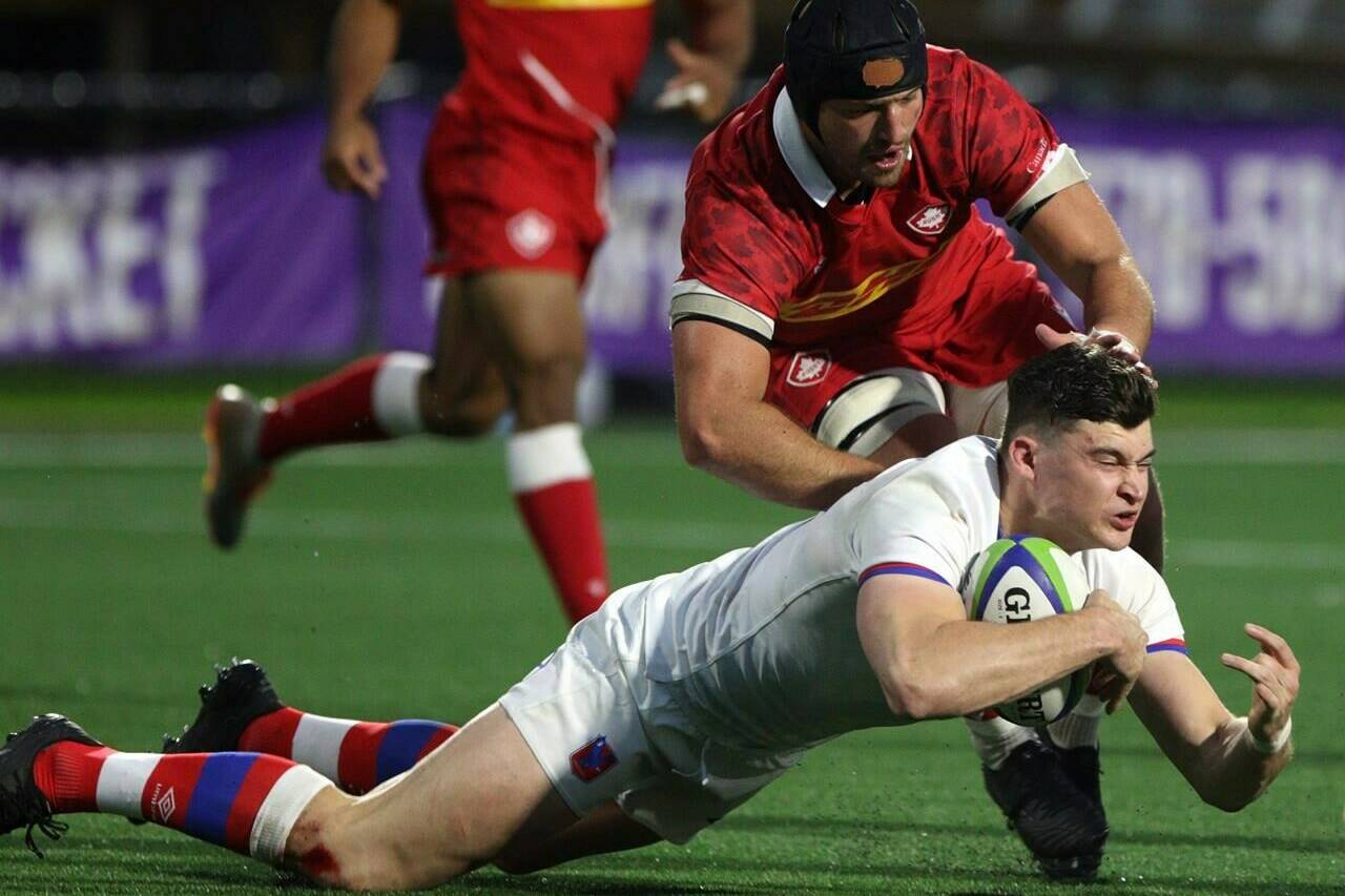 The U.S. has launched a bid to host both the men’s and women’s Rugby World Cup with Vancouver billed as a potential host city. Canada’s Corey Thomas tackles Chile’s Nicolas Garafulic during the second half of a Rugby World Cup 2023 qualification match at Starlight Stadium in Langford, B.C., on Saturday, October 2, 2021. THE CANADIAN PRESS/Chad Hipolito