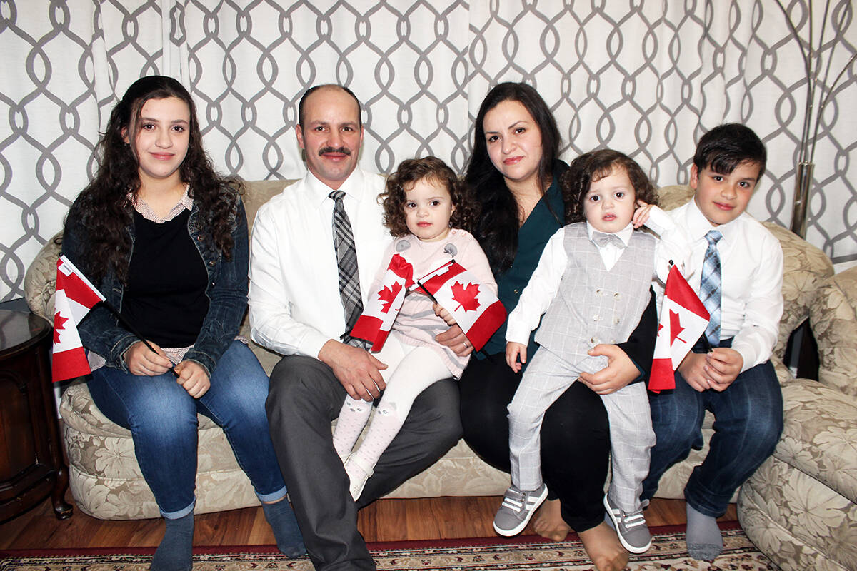 The Kaiyalis are one happy family to have received their Canadian citizenship. (Photo by Don Bodger)