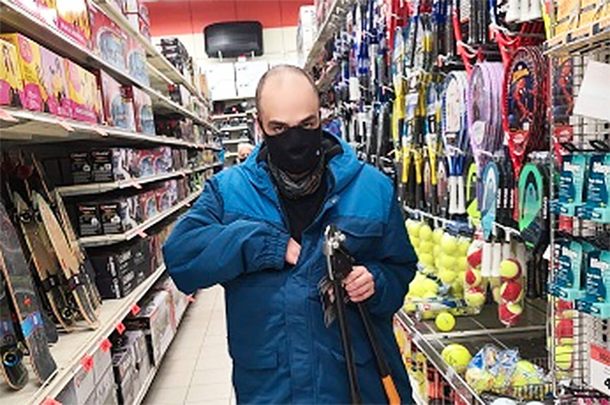 West Shore RCMP was asking for the public’s help in identifying this man who is a suspect in an armed robbery at the Canadian Tire on Langford Parkway, which took place Nov. 1. (Photo courtesy West Shore RCMP)