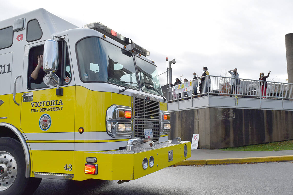Victoria Fire Department’s Fire Engine 11 drives past the pediatric unit of Victoria General Hospital. The Professional Fire Fighters of Greater Victoria announced a 10-year pledge of $250,000 to the unit. (Kiernan Green/News Staff)