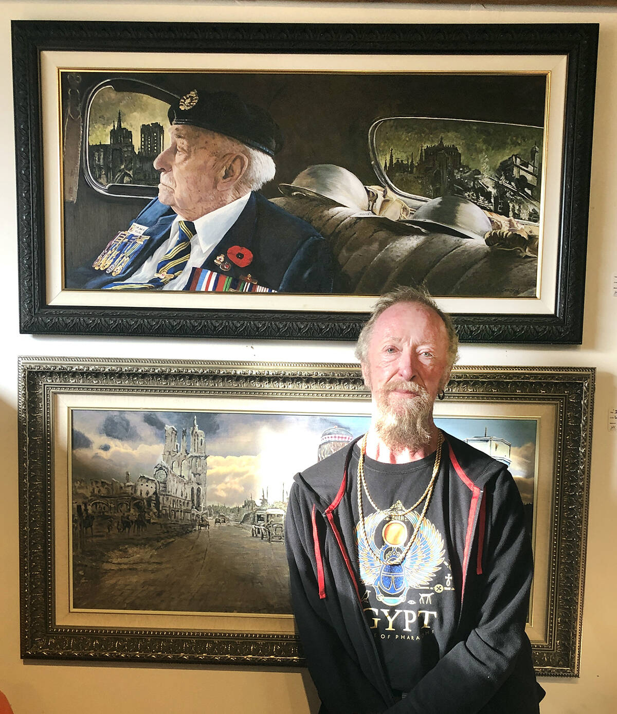 Artist Linda (Gord) Gordon in the Sooke Arts Gallery with the painting of Jack Cockrell. Cockrell served as a lieutenant in the Royal Canadian Armoured Corps during the Second World War. He died in 2008. (Contributed - Linda (Gord) Gordon)