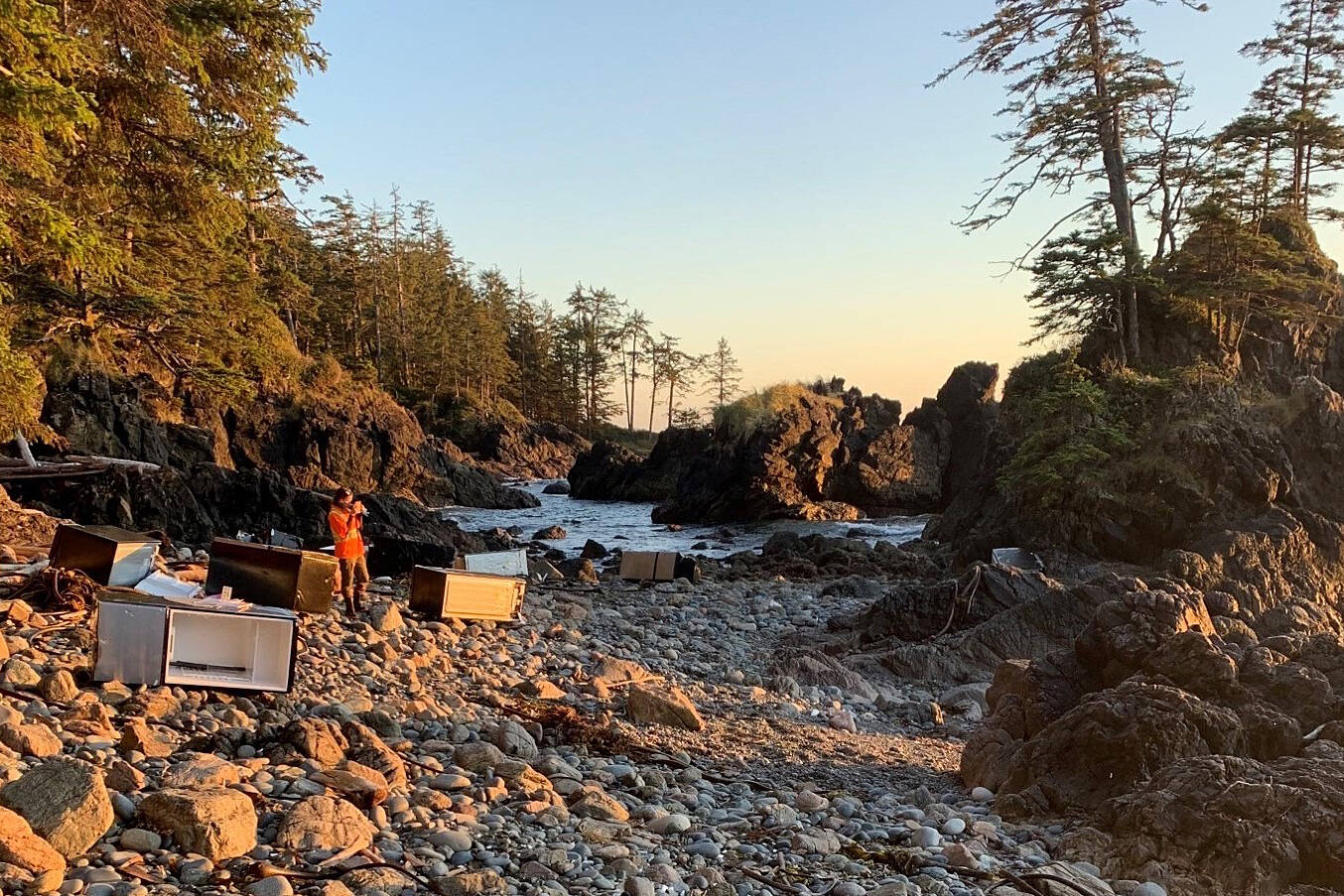 Someone onshore documents the position of a load of refrigerators that made it to shore near Cape Scott after more than 100 containers fell off the M/V Zim Kingston container ship in late October. (PHOTO COURTESY CDN. COAST GUARD)