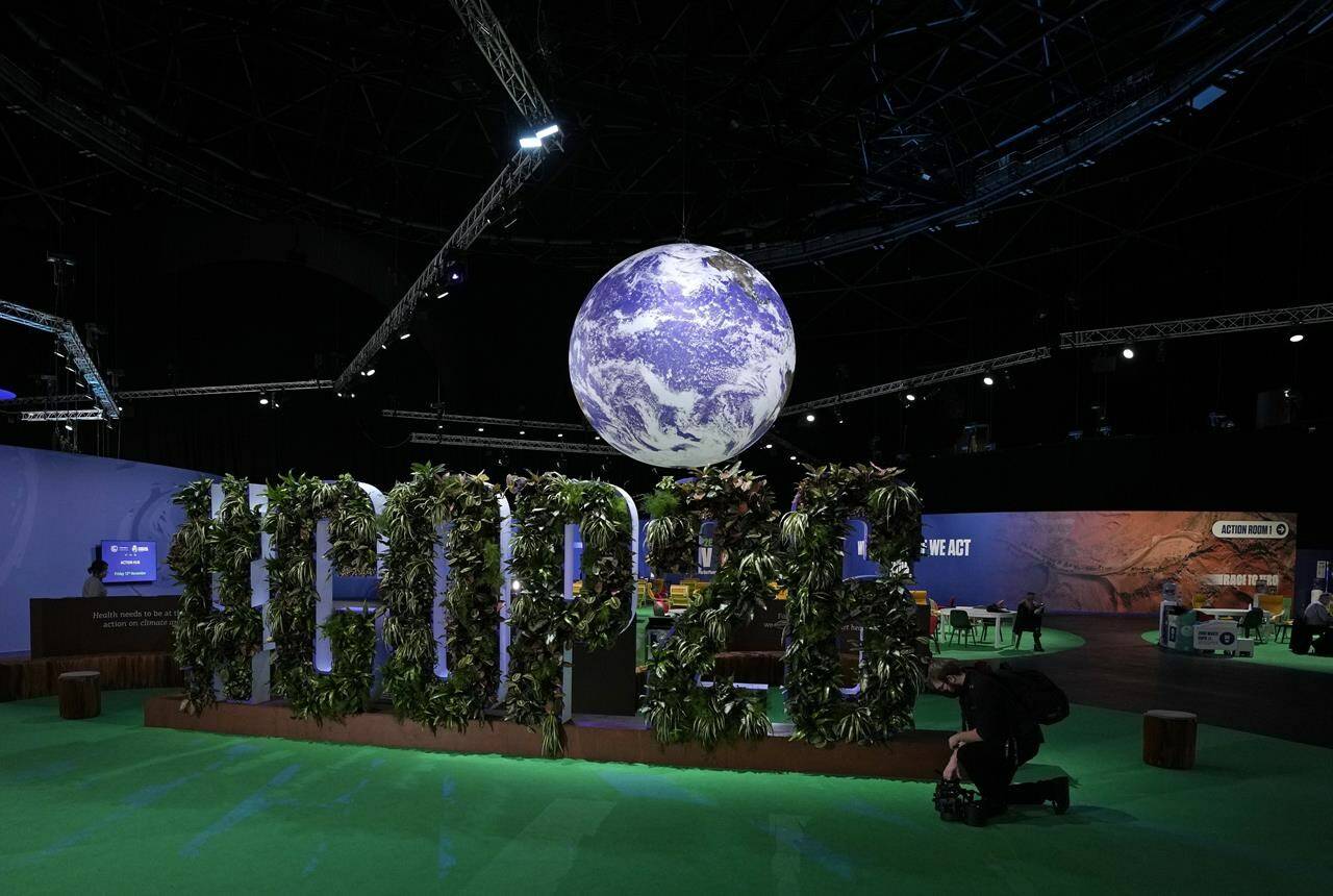 People start to gather near the Action Zone inside the venue of the COP26 U.N. Climate Summit in Glasgow, Scotland, Friday, Nov. 12, 2021. THE CANADIAN PRESS/AP, Alastair Grant