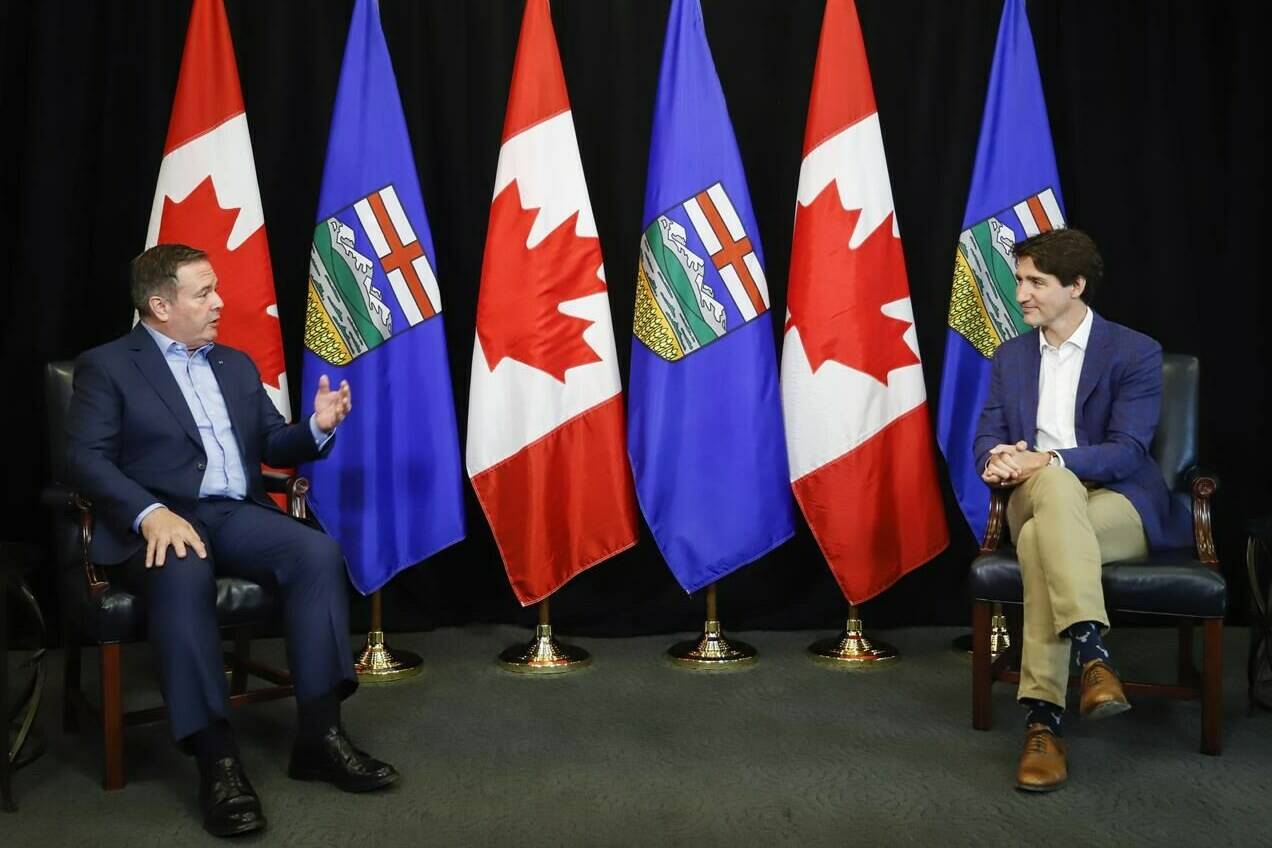 Prime Minister Justin Trudeau, right, meets with Alberta Premier Jason Kenney in Calgary, Alta., Wednesday, July 7, 2021. Prime Minister Justin Trudeau and Alberta Premier Jason Kenney will announce a deal they've reached on child care during an event in Edmonton today. THE CANADIAN PRESS/Jeff McIntosh