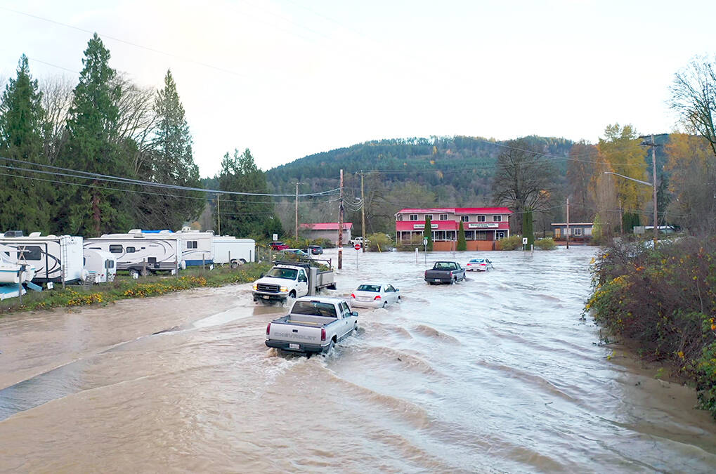 Cars are barely able to pass through at the corner of Crofton and Chemainus Roads before the area was closed. (Photo by Shawn Wagar)