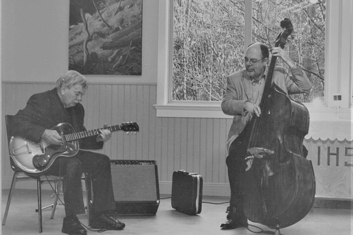 Canadian jazz guitarist Jim Kilburn, left, and son Rick. Jim Kilburn died on Nov. 13, 2021 at his home in Qualicum Beach. (Submitted photo)