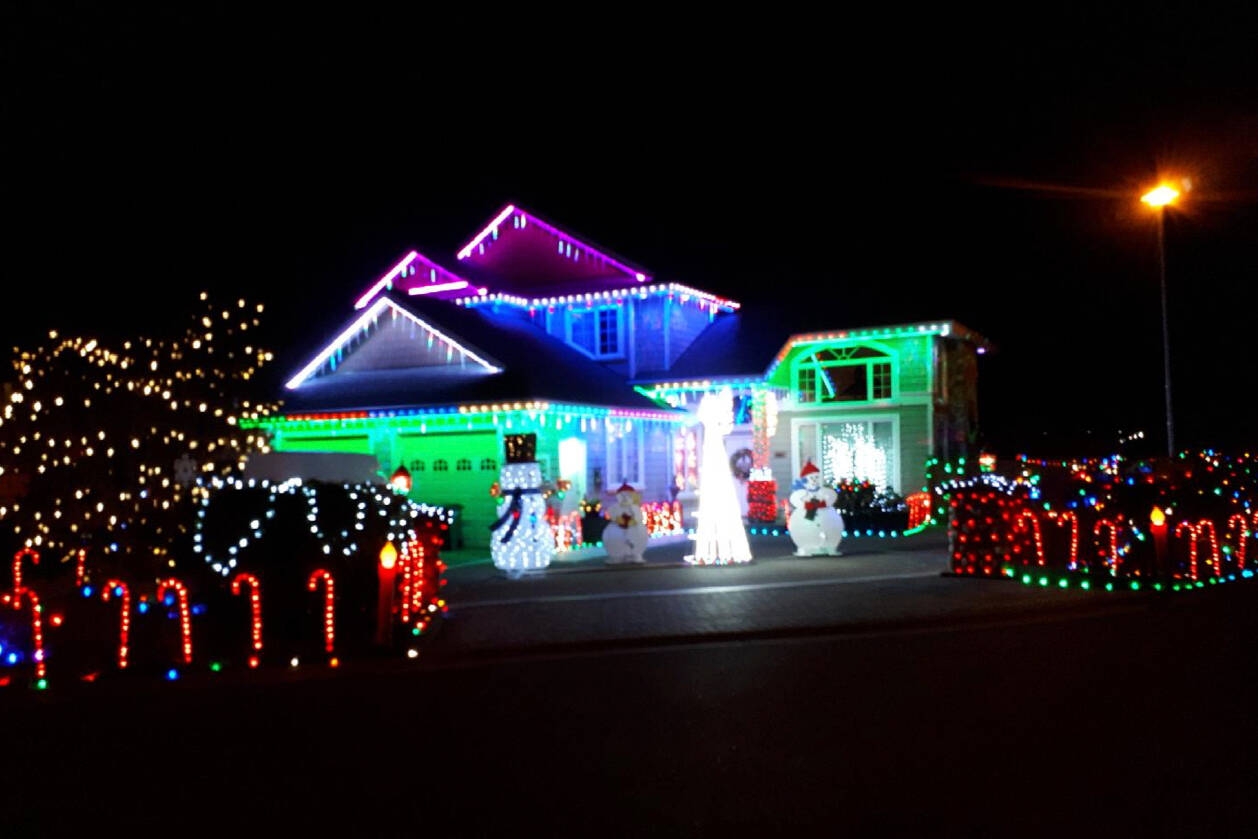 Greater Victoria residents are encouraged to light up their properties with holiday decorations this month, and to enter into the Light up the City contest though vicnews.com/contests, with the top-voted displays earning prizes from Helijet International, Peninsula Co-op, and other local sponsors. Pictured is a display from the 2020 contest. (Photo Courtesy of Greater Victoria Festival Society)