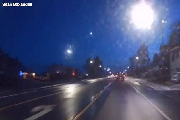 Sean Baxandall was driving south of Campbell River when he saw a bright flash of light (centre of screen) moving fast through the sky on Sunday, Dec. 12, 2021. (SCREENSHOT FROM VIDEO)