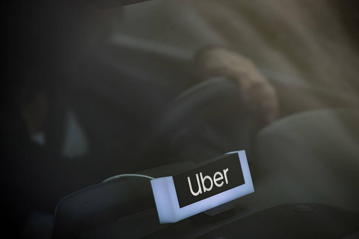 FILE – An Uber driver is seen in Vancouver, Friday, Jan. 24, 2020. THE CANADIAN PRESS/Darryl Dyck