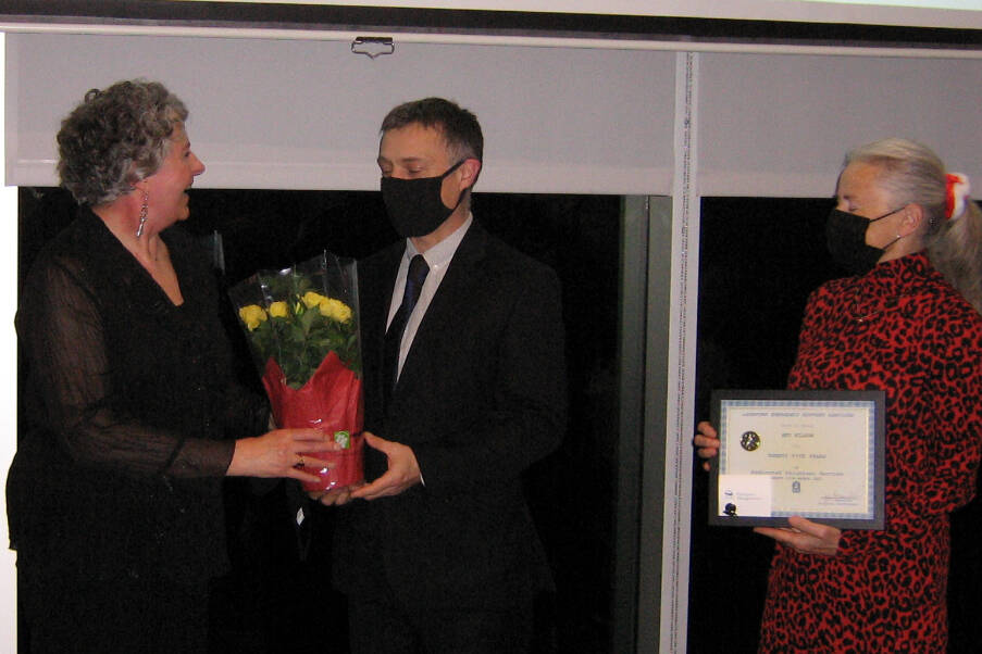 Langford Emergency Social Services co-founder Beverly Wilson, left, receives recognition from Langford Fire Rescue Chief Chris Aubrey during a celebration of the volunteer organzation’s 25th anniversary. (Photo Courtesy of Langford ESS)