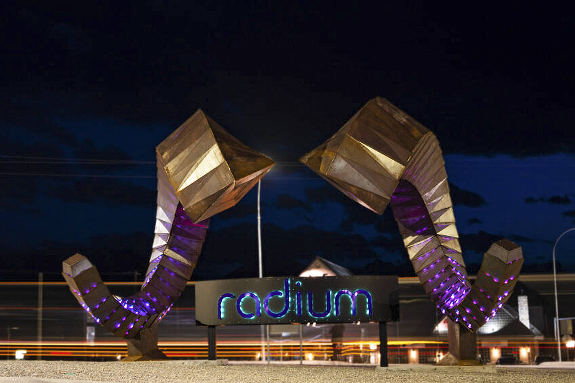 A Salmon Arm artist worked with talented local fabricators to create an enormous set of steel bighorn sheep horns to greet visitors to Radium Hot Springs. (Village of Radium Hot Springs image)