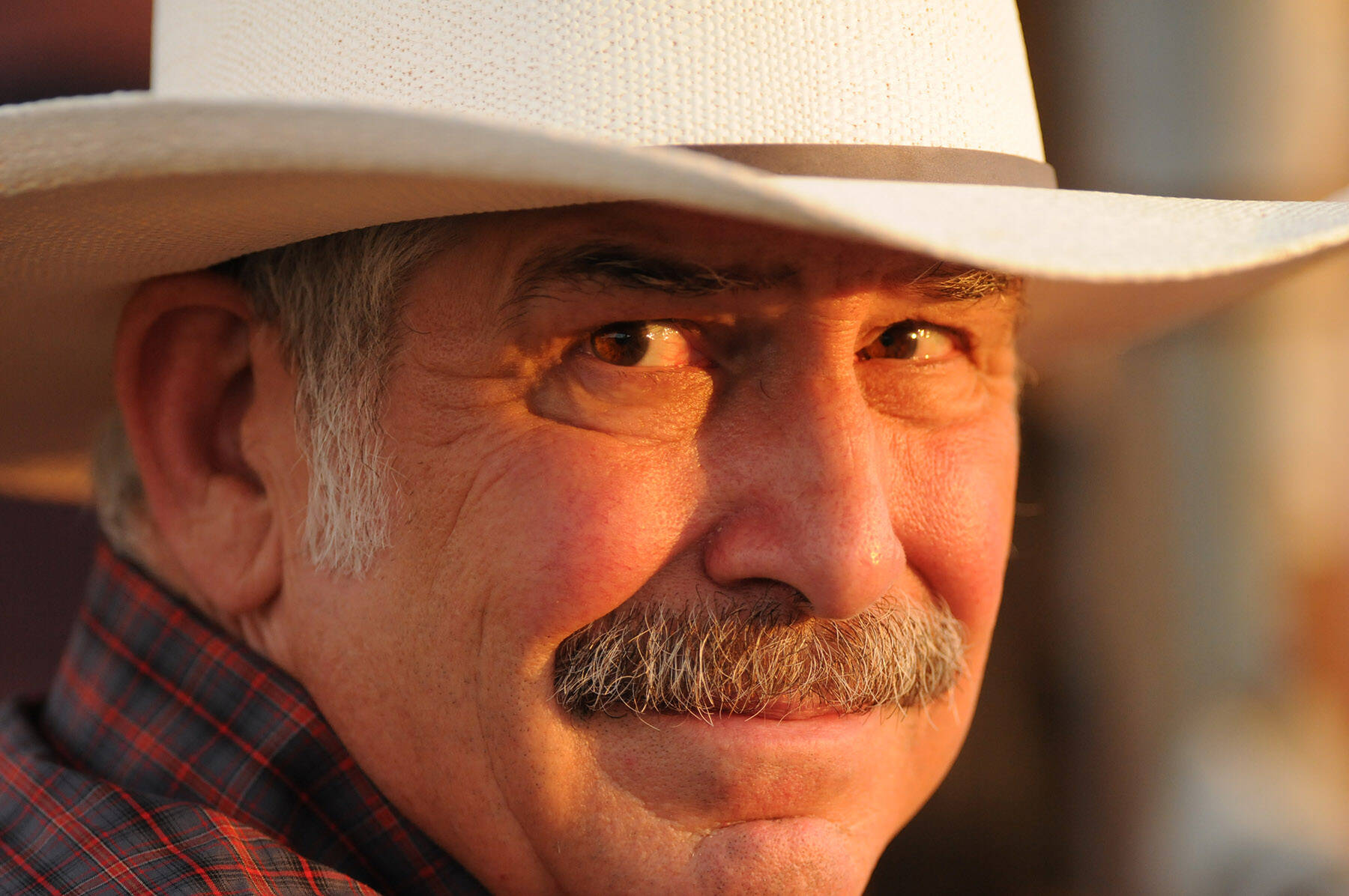 Doug Perry wears a cowboy hat while attending the Chilliwack Rodeo on Aug. 9, 2013. Saturday, Jan. 15, 2022 is Hat Day. (Jenna Hauck/ Chilliwack Progress file)