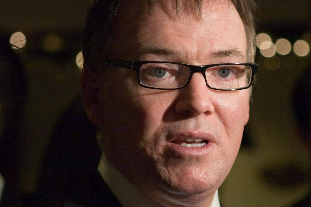 Former B.C. finance minister Kevin Falcon speaks to media prior to a provincial, territorial and federal finance ministers meeting in Victoria on Monday, Dec. 19, 2011. THE CANADIAN PRESS/Geoff Howe