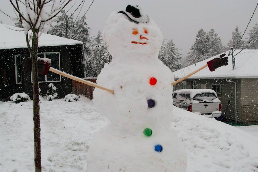 While the weather is great for building snowmen, some are wishing the snowy weather would give way to milder temperatures. (Black Press file photo)