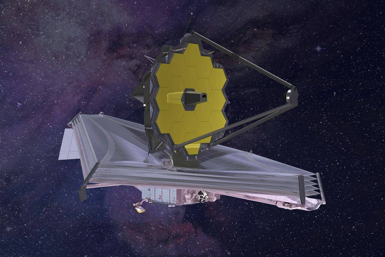 FILE - This 2015 artist’s rendering provided by Northrop Grumman via NASA shows the James Webb Space Telescope. On Monday, Jan. 24, 2022, the world’s biggest and most powerful space telescope reached its final destination 1 million miles away, one month after launching on a quest to behold the dawn of the universe. (Northrop Grumman/NASA via AP)