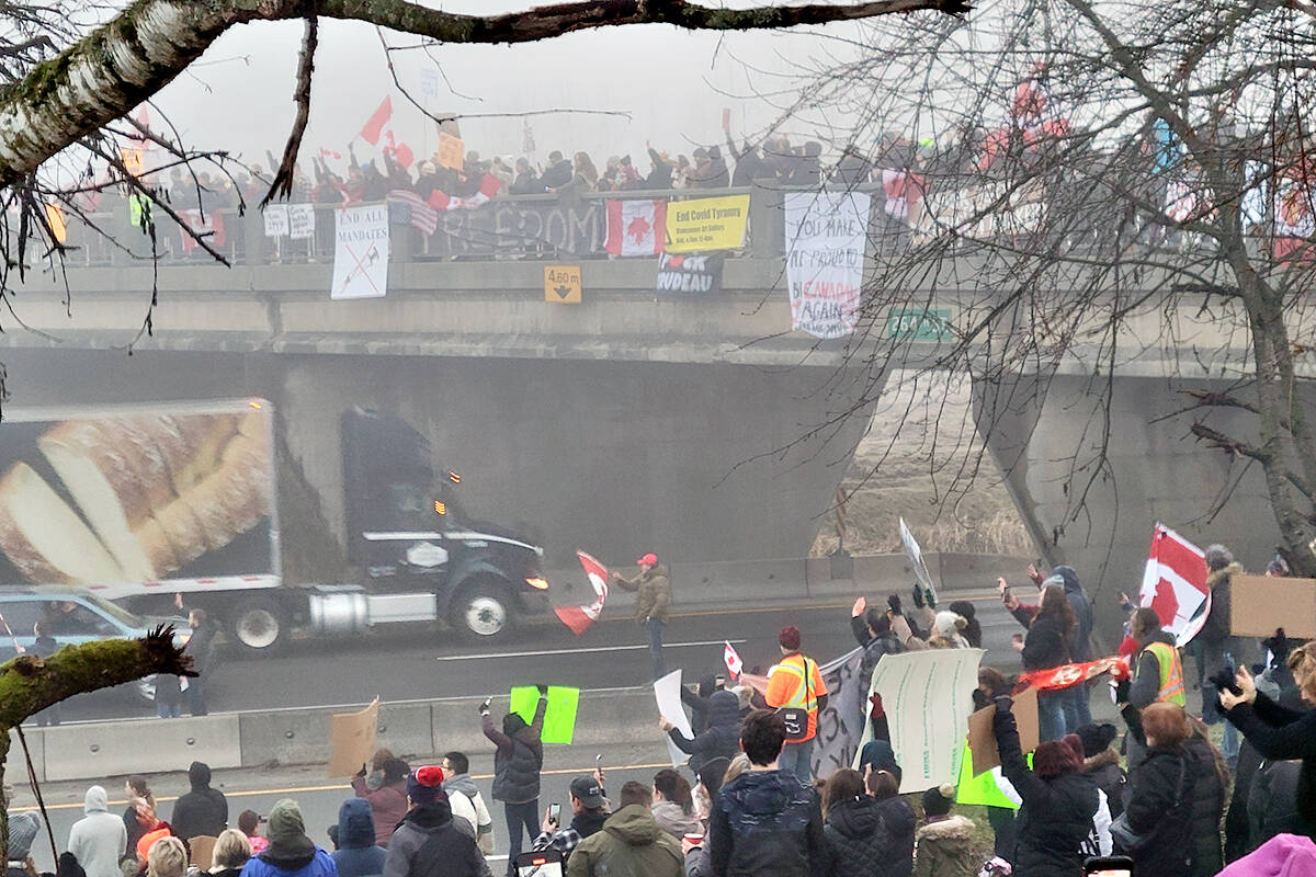 Supporters cheered on a procession of trucks on Sunday morning, Jan. 23, as they passed through Langley en route to Ottawa to protest vaccine mandates. (Langley Advance Times file)