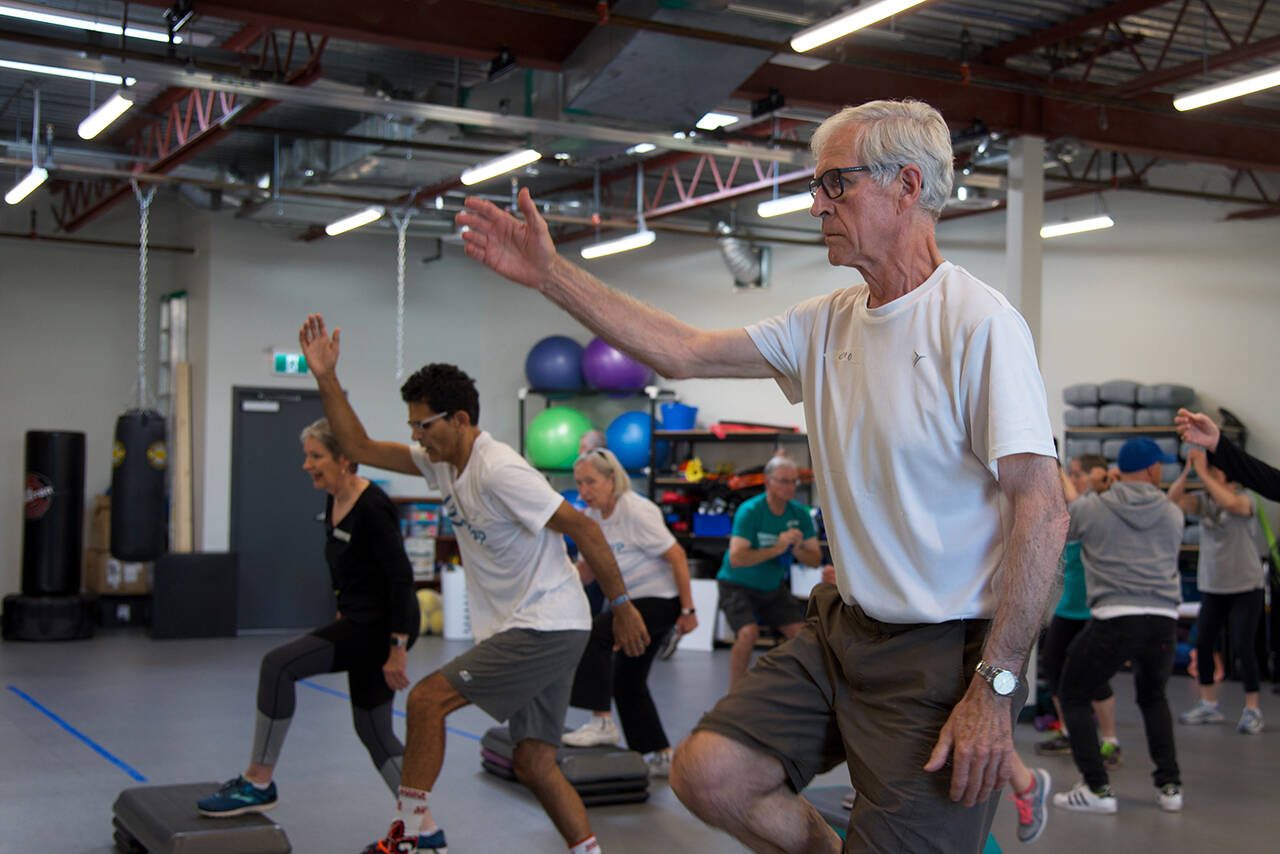 Members of the Parkinson Wellness Project take part in an exercise class, weeks before the centre’s closure in 2020 due to the pandemic. (Black Press Media file photo)