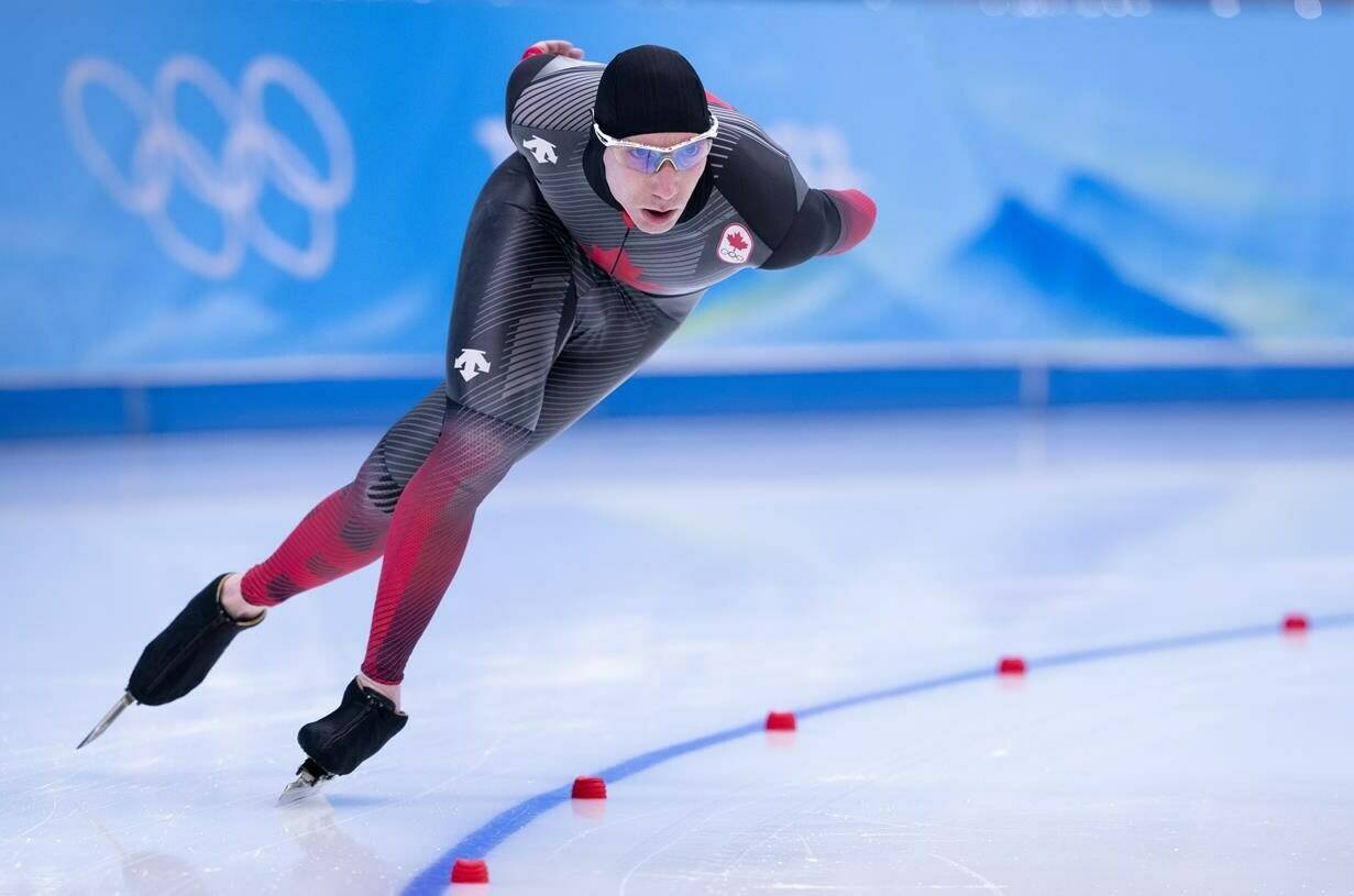 Canada’s Ted-Jan Bloeman powers around the oval in the men’s 5,000 metre speedskating race at the 2022 Winter Olympics in Beijing on Sunday, February 6, 2022. THE CANADIAN PRESS/Paul Chiasson