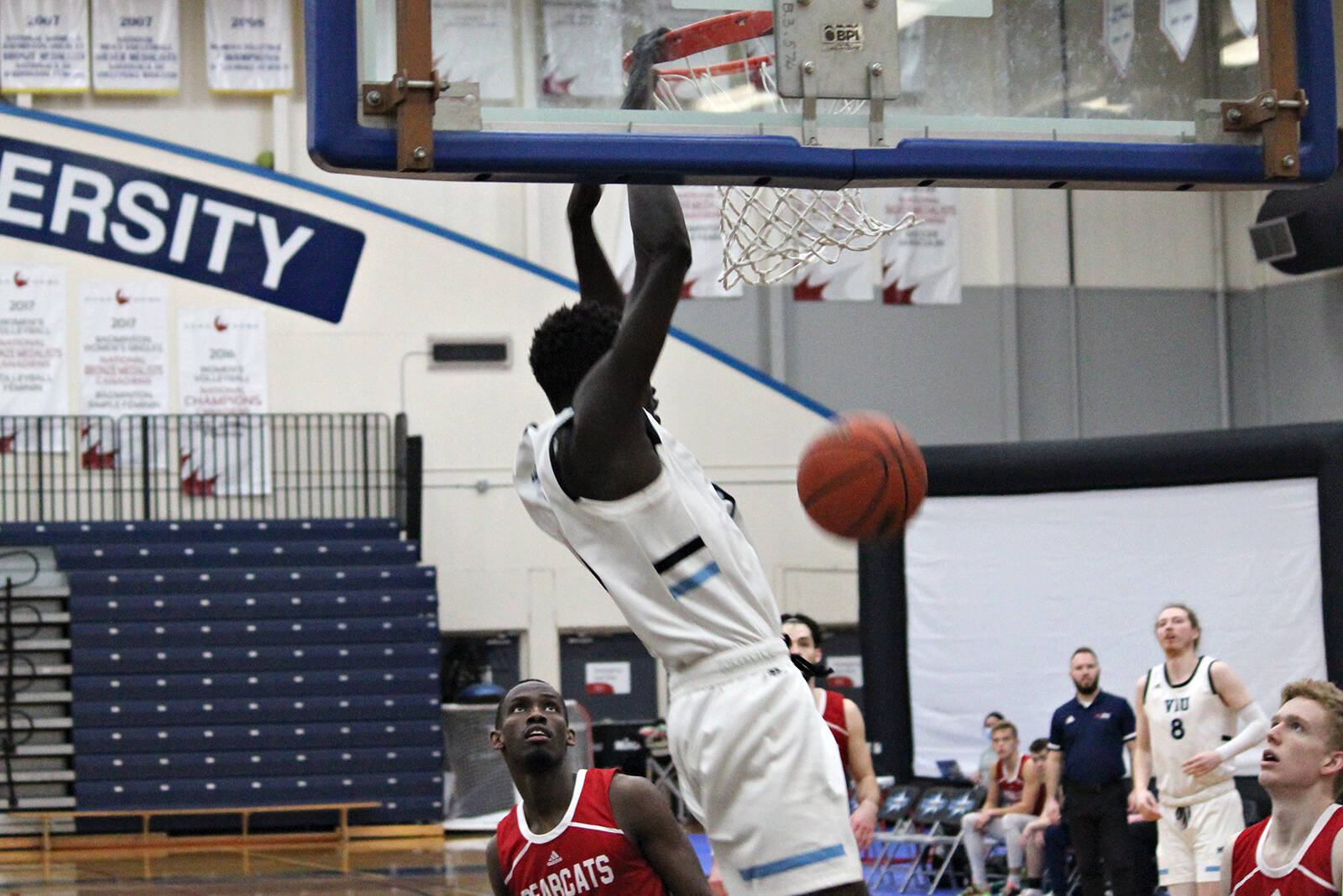 VIU Mariners player Akoi Yuot slam-dunks the basketball during a game against the Columbia Bible College Bearcats in PacWest action at the Vancouver Island University gym on Saturday, Feb. 5. (Karl Yu/News Bulletin)