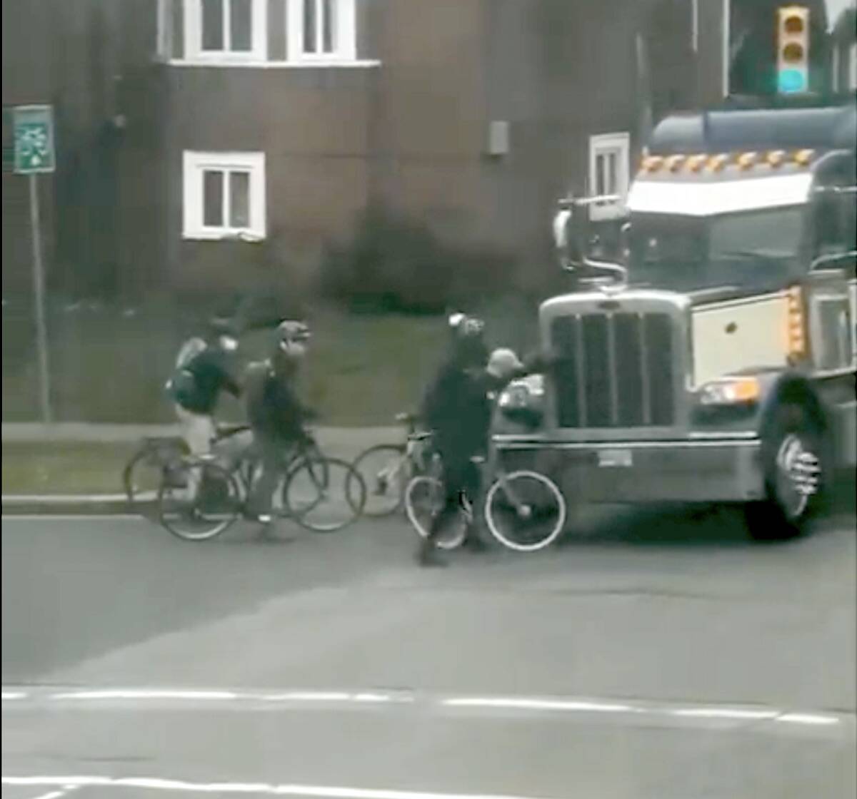 Screenshot of video posted on Facebook of a trucker accused of a hit and run of a cyclist in Vancouver on Feb. 6, 2022. (Facebook)