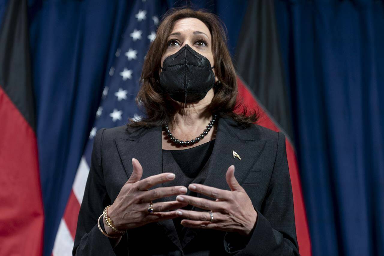 Vice President Kamala Harris speaks to members of the media at her hotel after attending the Munich Security Conference, Sunday, Feb. 20, 2022, in Munich. (AP Photo/Andrew Harnik, Pool)