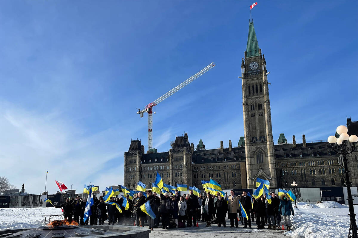 A group of Canadian members of parliament gathered at the Centennial Flame in front of Parliament this week in honour of Ukraine. (MP Ed Fast Facebook photo)