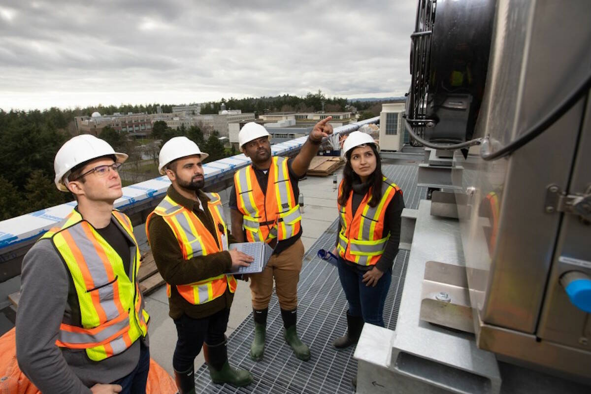 University of Victoria’s Ralph Evins (left), Haris Shamsi, Rajeev Kotha and Mahsa Torabi are part of team called ReBuild, which is working on a database of building retrofit best practices aimed at making them more energy efficient, low carbon and resilient to climate change. (Photo courtesy of Armando Tura/University of Victoria)