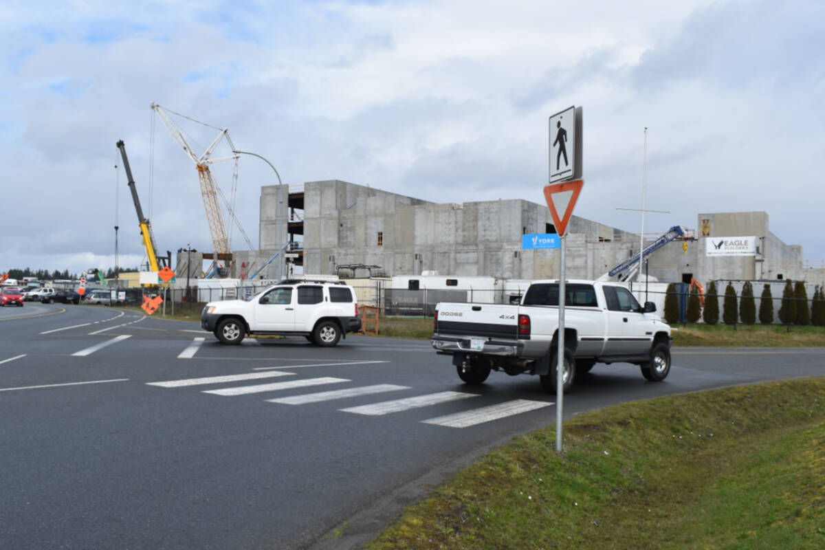 Sidney announced Monday it will cover 40 per cent of the $4.9 million going toward road improvements near the future site of the Amazon distribution under construction on lands within municipal boundaries under the authority of the Victoria Airport Authority, whose share of the costs will also be 40 per cent. North Saanich will cover the remaining 20 per cent. Those improvements include a roundabout at the corner of Beacon Avenue West and Galaran Road. (Black Press Media file photo)