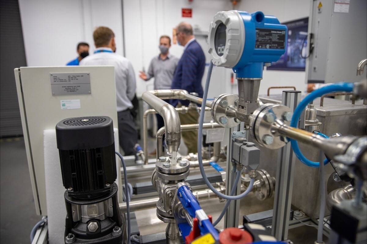B.C. Energy Minister Bruce Ralston tours Cellcentric’s hydrogen fuel cell plant in Burnaby, August 2021. Cellcentric is a German-based partnership of Mercedes Benz and Volvo, developing zero-emission heavy trucks. (B.C. government photo)