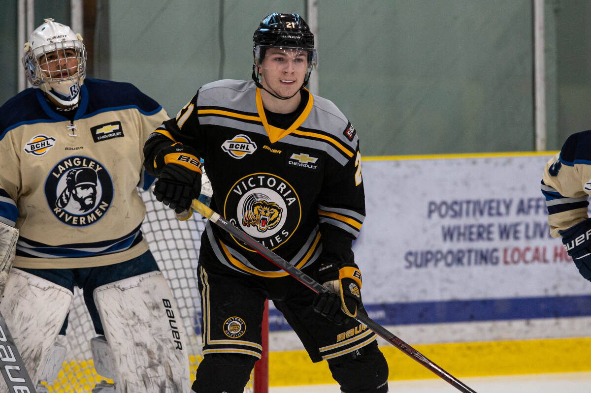 Victoria Grizzlies forward Connor Eddy stands in front of Langley Rivermen goalie Ajeet Gundarah Friday night during game one of the first BCHL playoff series in Langley. (Garrett James BCHL/Twitter)