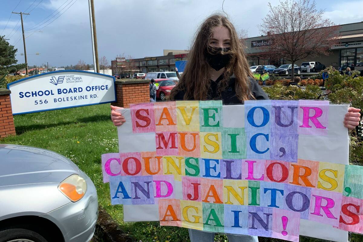 Colquitz Middle School student Quinn McBride protests outside of the School District 61 building, April 4. (Kiernan Green/News Staff)