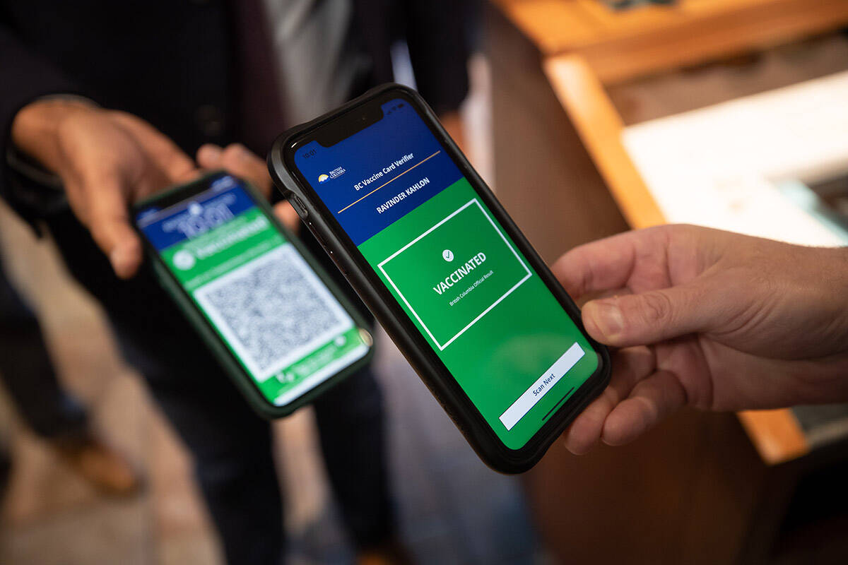 B.C. COVID-19 vaccine card scanned on entry to a restaurant, a requirement since the fall of 2021. The restriction is being lifted as of April 8, 2022. THE CANADIAN PRESS/Darryl Dyck