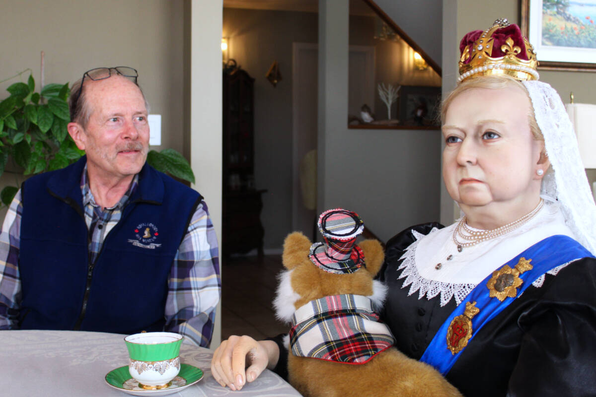 Ken Lane, former director of the Royal London Wax Museum which closed in 2010, sits with a life-like wax rendition of Queen Victoria. (Megan Atkins-Baker/News Staff)