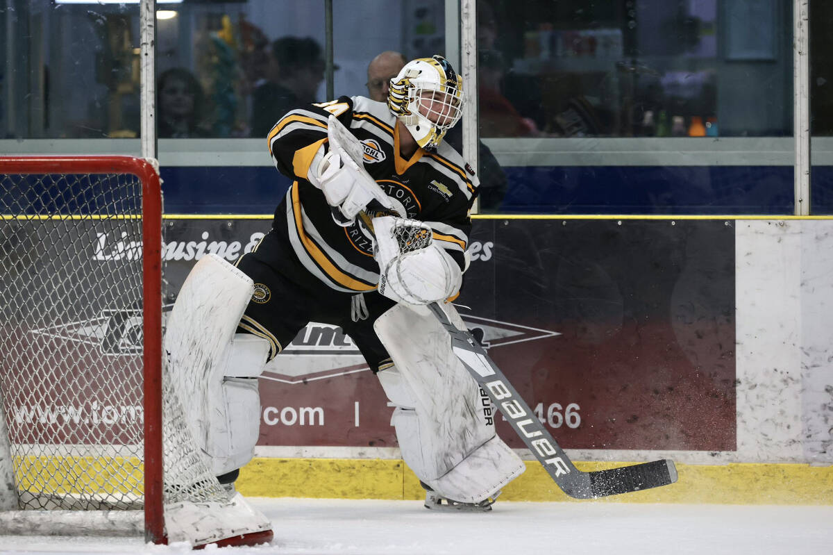 Victoria Grizzlies goaltender Cole Schwebius handles the puck Friday night during Game 5 of the first round of BCHL playoffs against the Langley Rivermen. (Garrett James BCHL/Twitter)