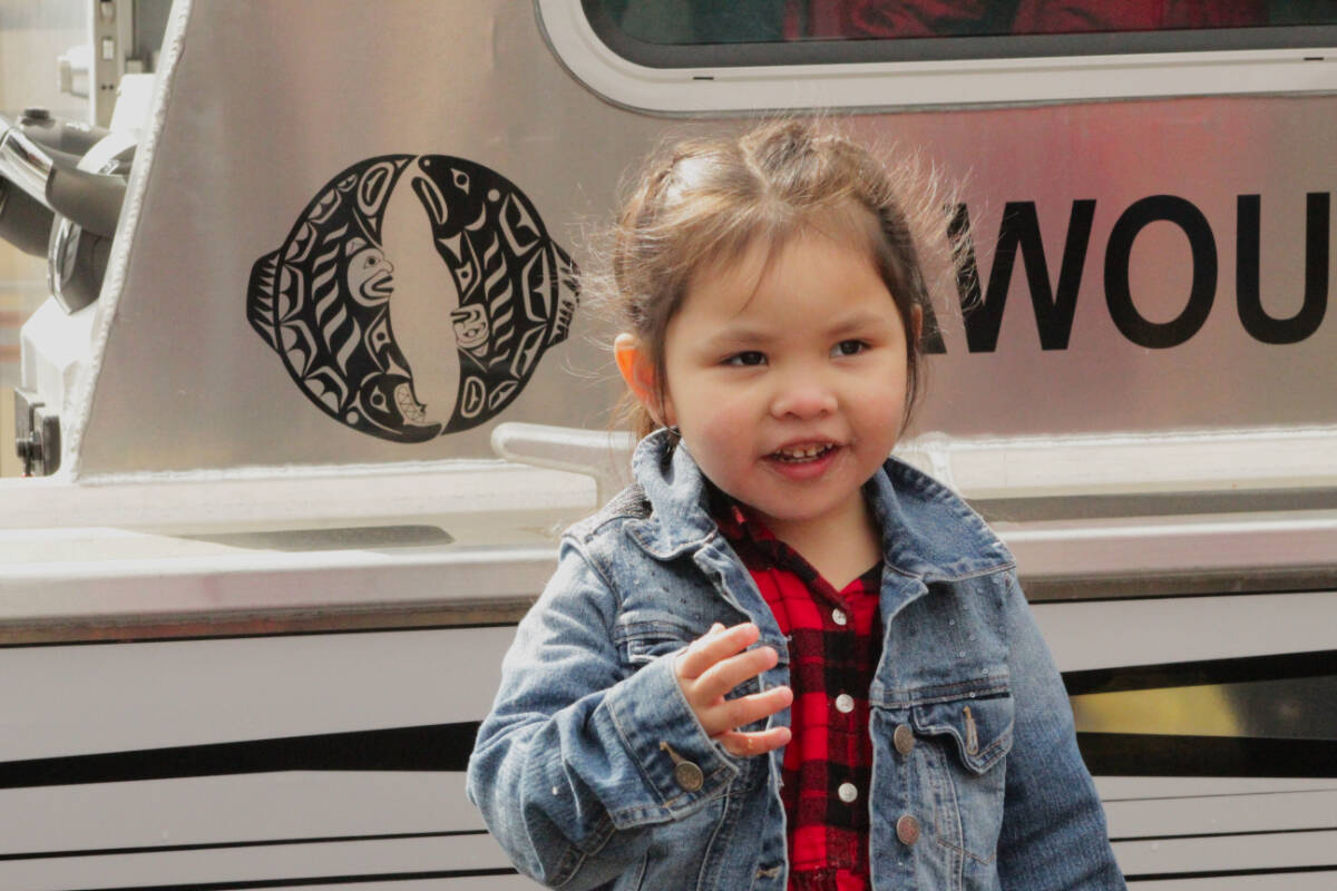 The fishing vessel Baby Jade, named for this Tsawout Nation toddler, was officially blessed by elders Thursday at the James Island Pier. (Megan Atkins-Baker/News Staff)