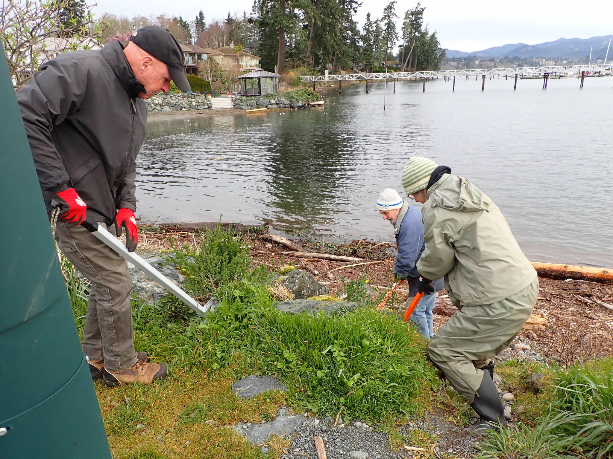The Juan de Fuca Community Trails Society is partnering with the District of Sooke to remove invasive plants from Broomhill Park on Earth Day (April 22). Volunteers shown here conducted a similar clean-up at Whiffin Spit in March. (Contributed - Juan de Fuca Community Trails Society)