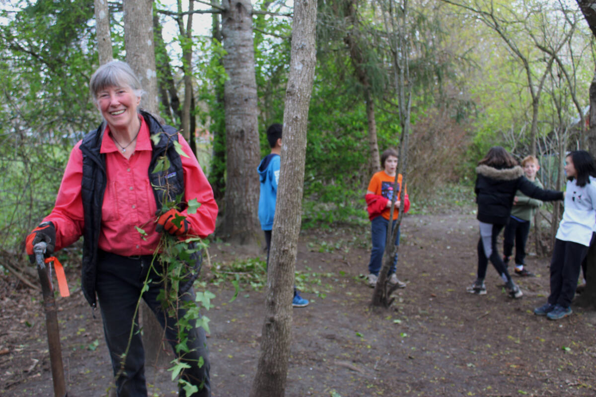 Long-time volunteer in the garden at Strawberry Vale Elementary, Sylvia Samborski, said it is magical to see children interacting hands-on with nature. (Megan Atkins-Baker/News Staff)