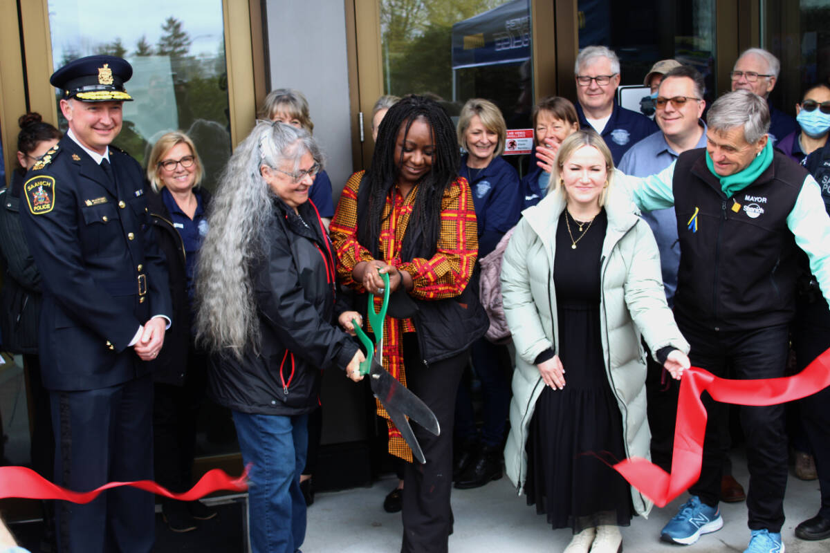 From left, Deputy Chief Const. Dean Duthie, Brenda Freeman, Pulcherie Mboussi, Kristy Lowes and Mayor Fred Haynes cut the ribbon at the official opening of the community safety office at Uptown Shopping Centre. (Megan Atkins-Baker/News Staff)
