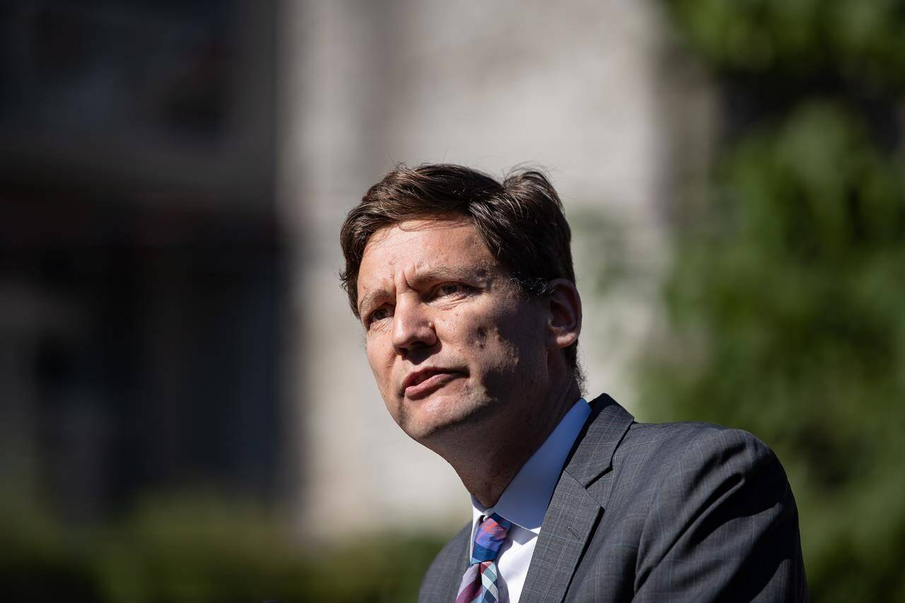 David Eby, B.C. Attorney General and Minister Responsible for Housing, speaks during a social housing funding announcement in the Downtown Eastside of Vancouver, on Wednesday, July 28, 2021. The British Columbia government says it has developed “a new approach to litigation” as part of its process to implement its 2019 legislation adopting the United Nations Declaration on the Rights of Indigenous Peoples.THE CANADIAN PRESS/Darryl Dyck