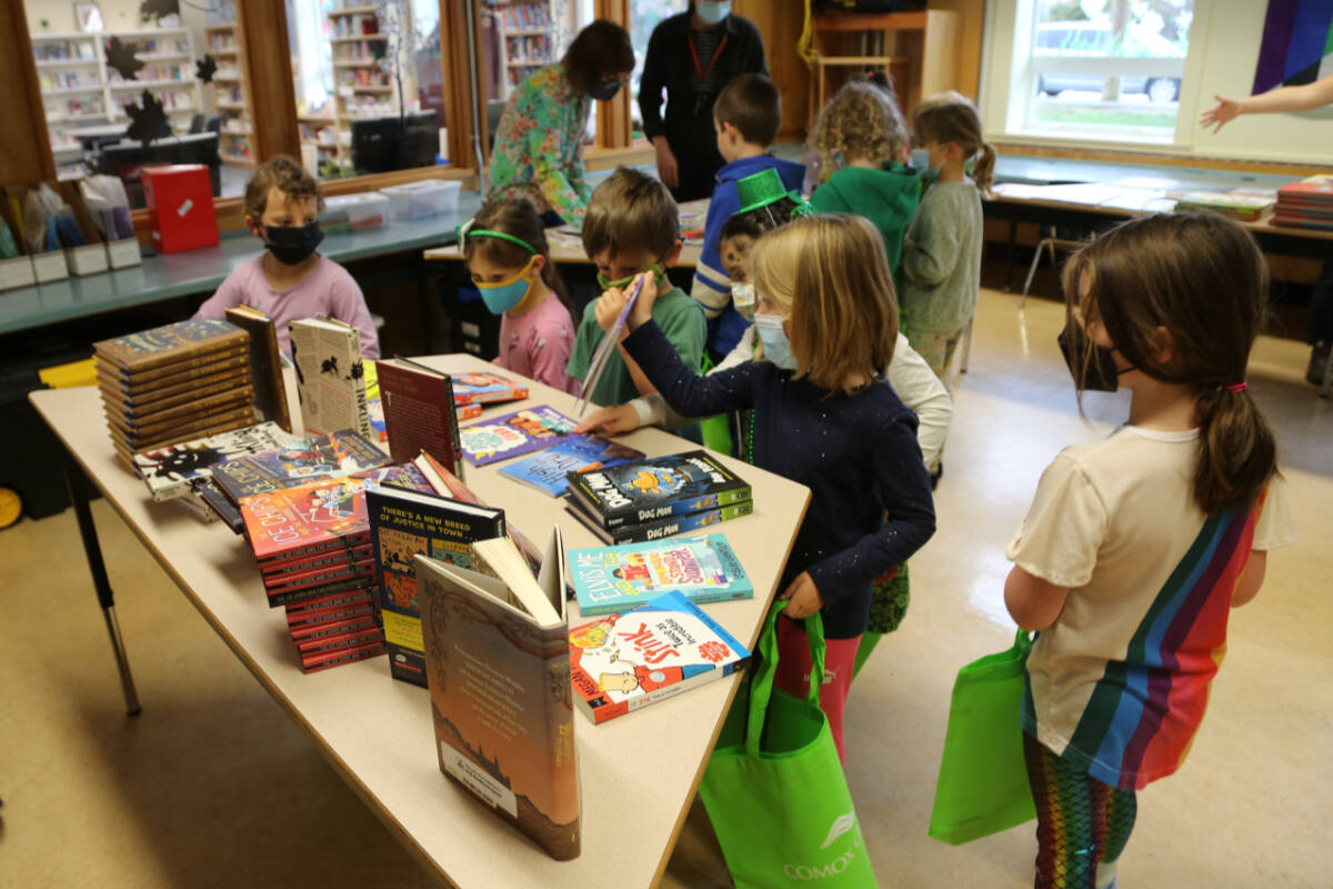 Each student gets a tote bag with gifts to go with their books. Photo supplied