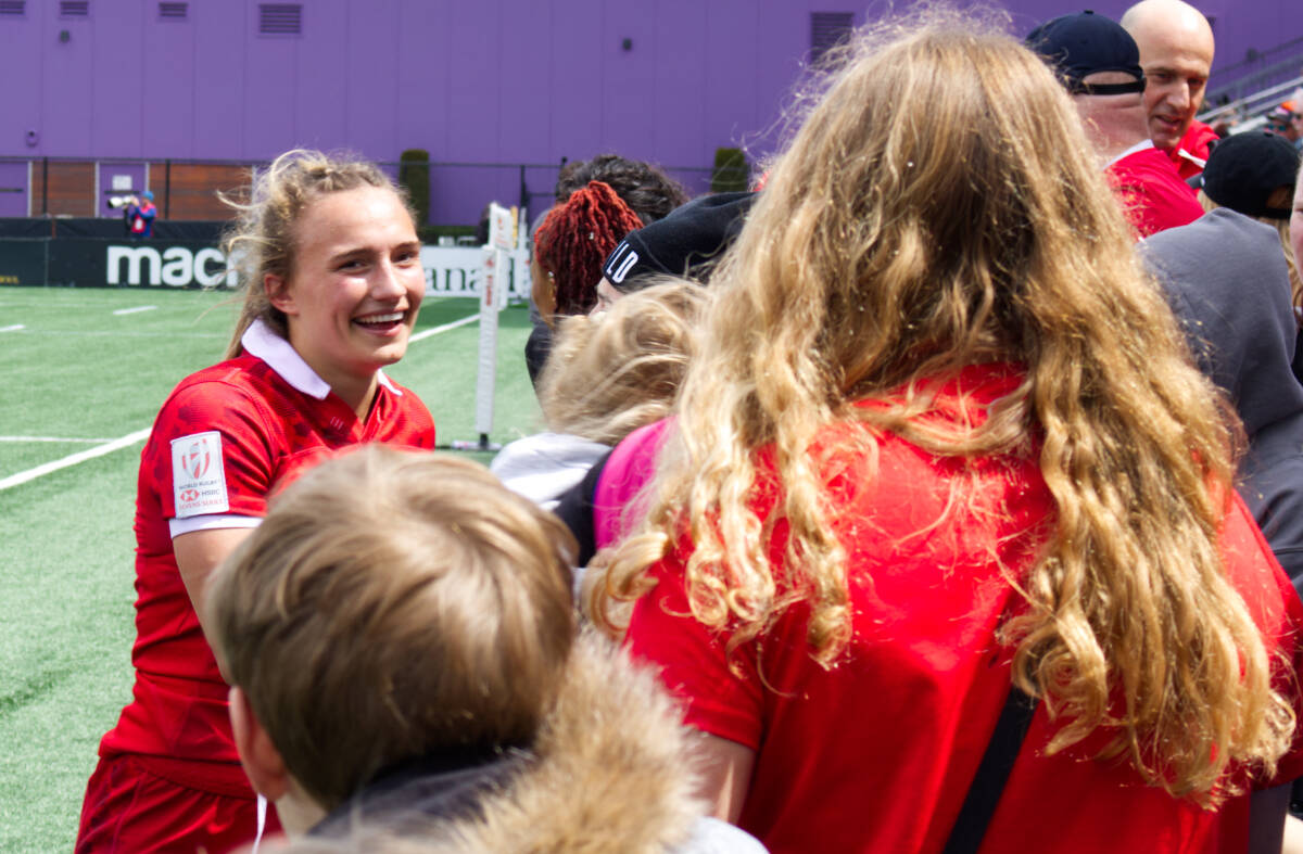 Krissy Scurfield greets young fans after a game during the HSBC Women’s Sevens Series tournament in Langford. (Bailey Moreton/News Staff)