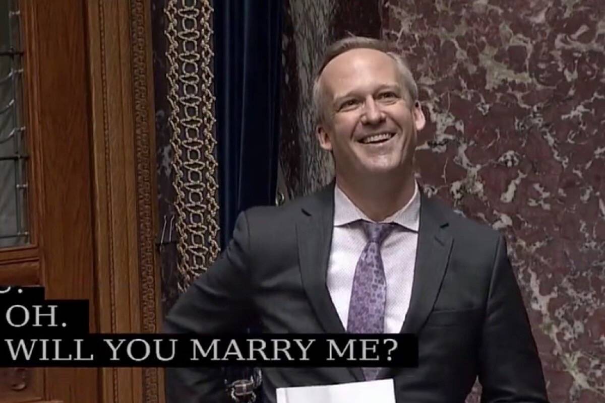 Port Moody-Coquitlam MLA Rick Glumac surprises his guest in his introduction of her in the B.C. legislature May 11, 2022. (Hansard TV)